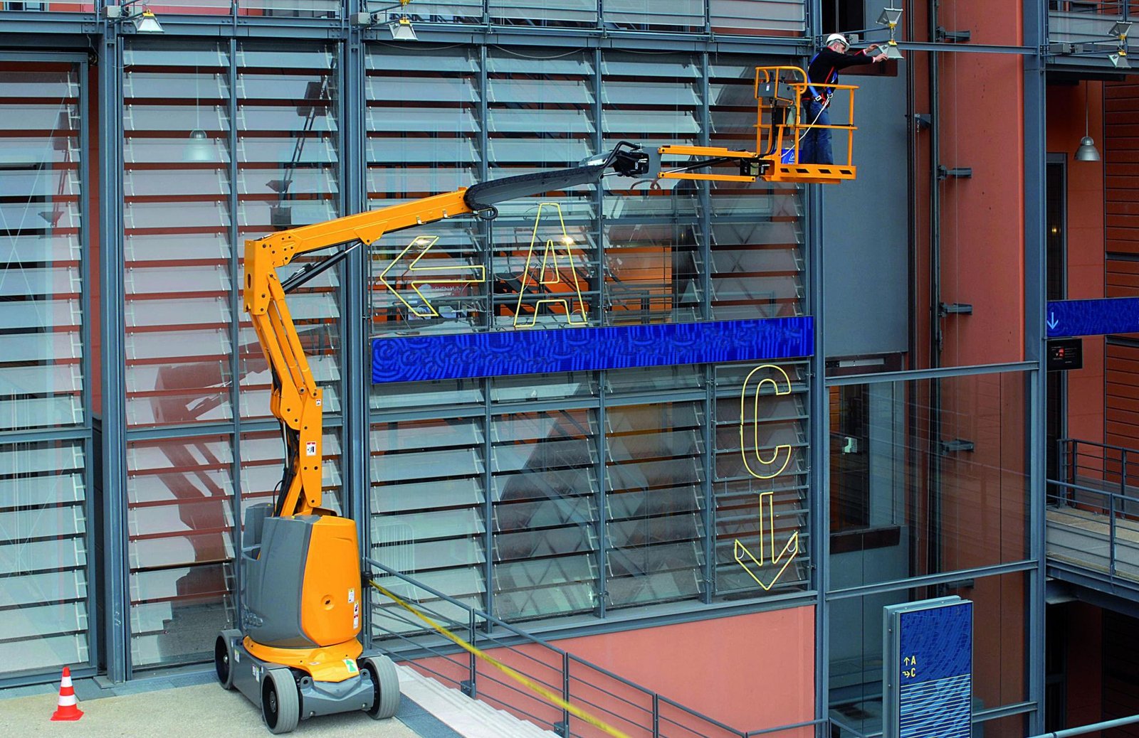 12 meter articulated boom lift used for elevated construction work